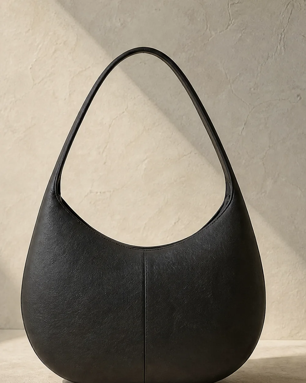 Aural Crescent Shoulder Bag in ink, back view
