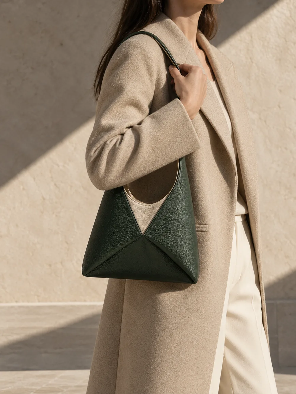 Tessel Three-Panel Shoulder Bag in deep forest worn with a tailored outfit