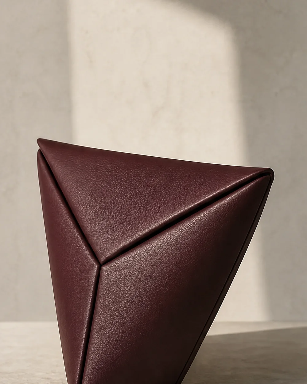 Triad Triangle Clutch in oxblood, side view