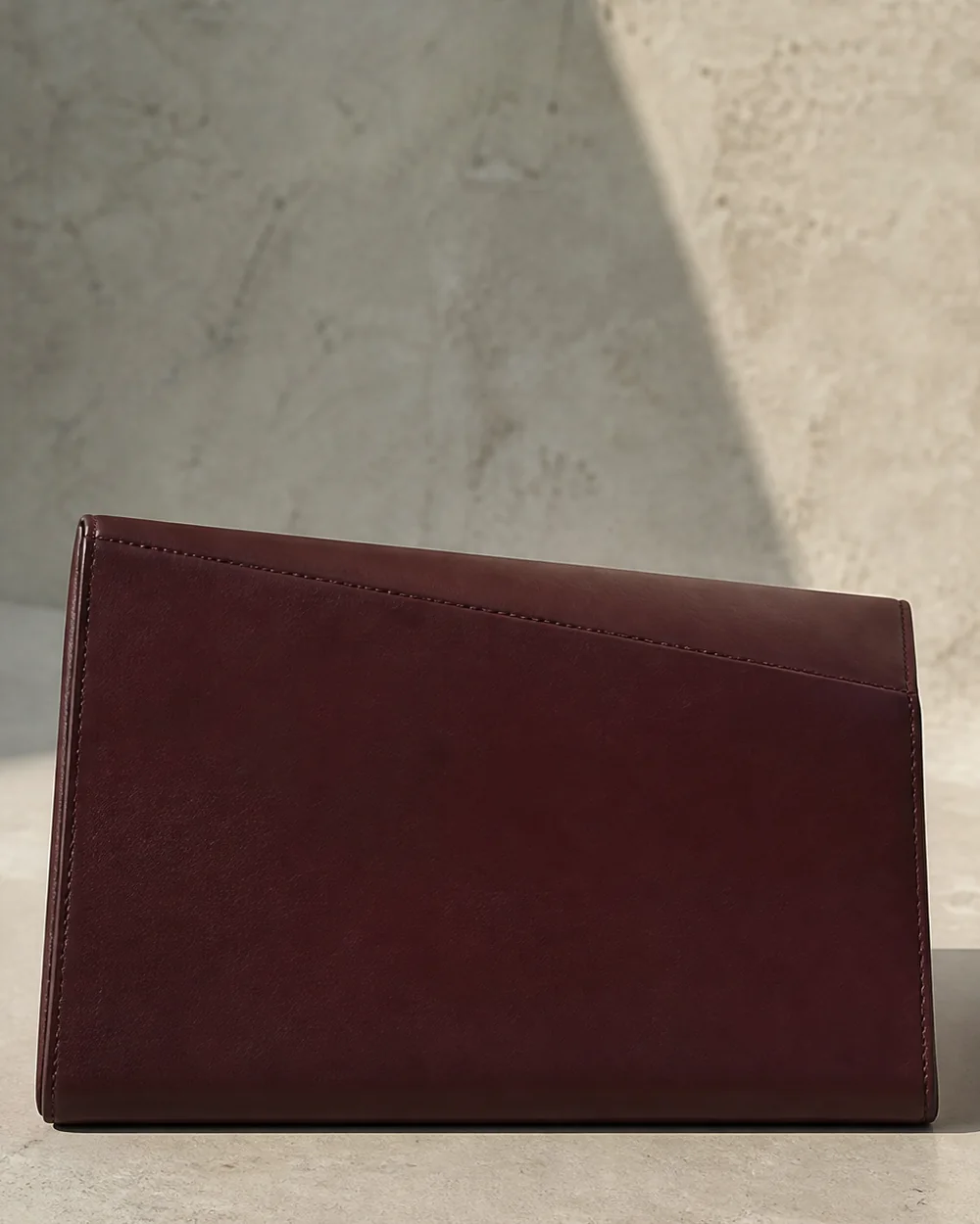 Gable Roof Clutch in oxblood, back view