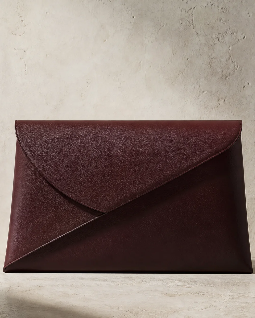 Parabola Envelope Clutch in oxblood, front view