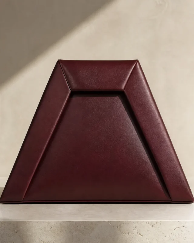 Inlet Trapezoid Clutch in oxblood, front view