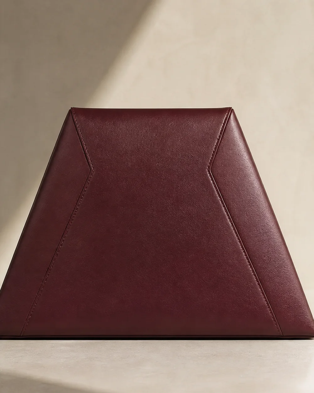 Inlet Trapezoid Clutch in oxblood, back view