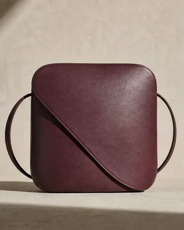 Turn Crossbody in plum, front view