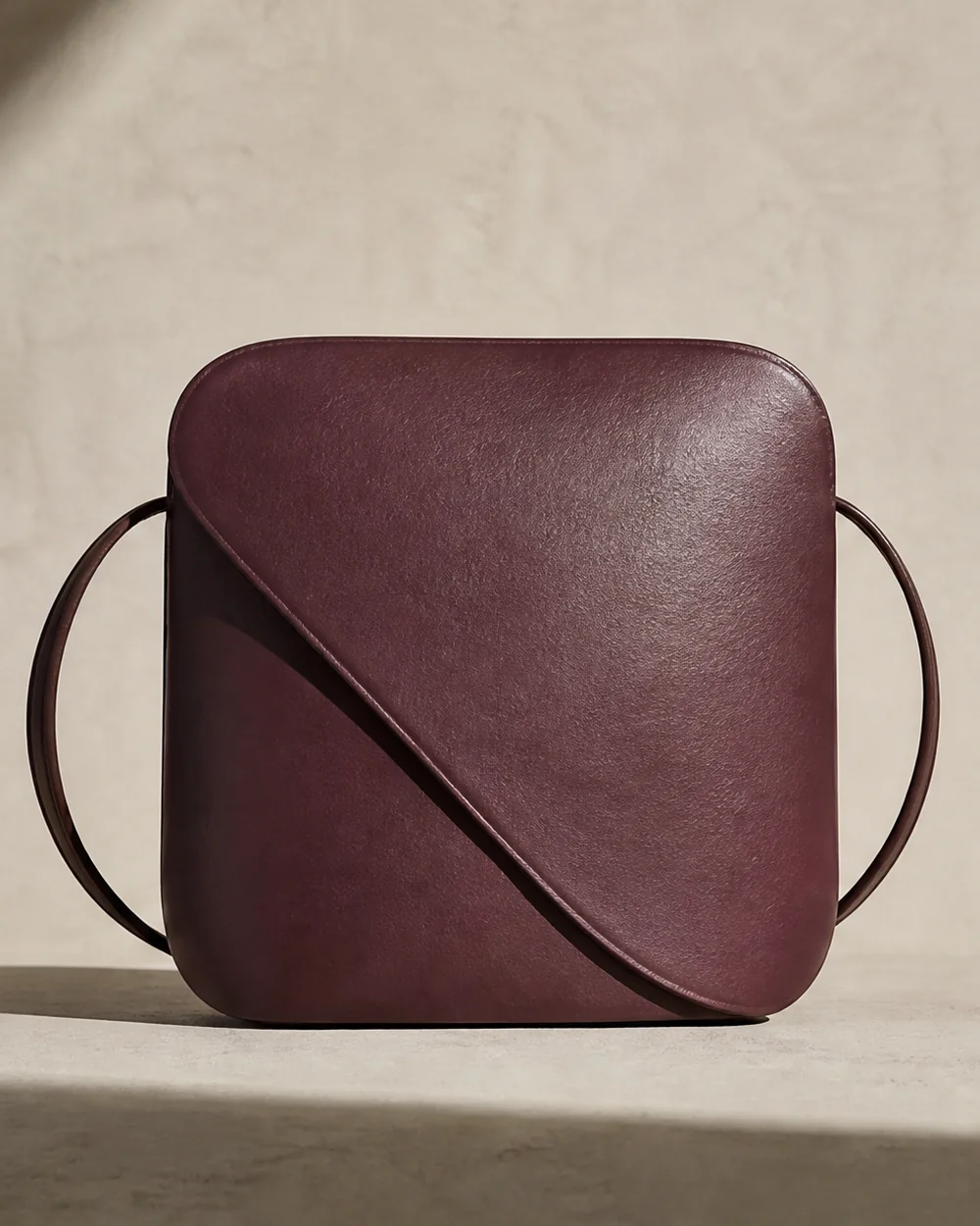 Turn Crossbody in plum, front view