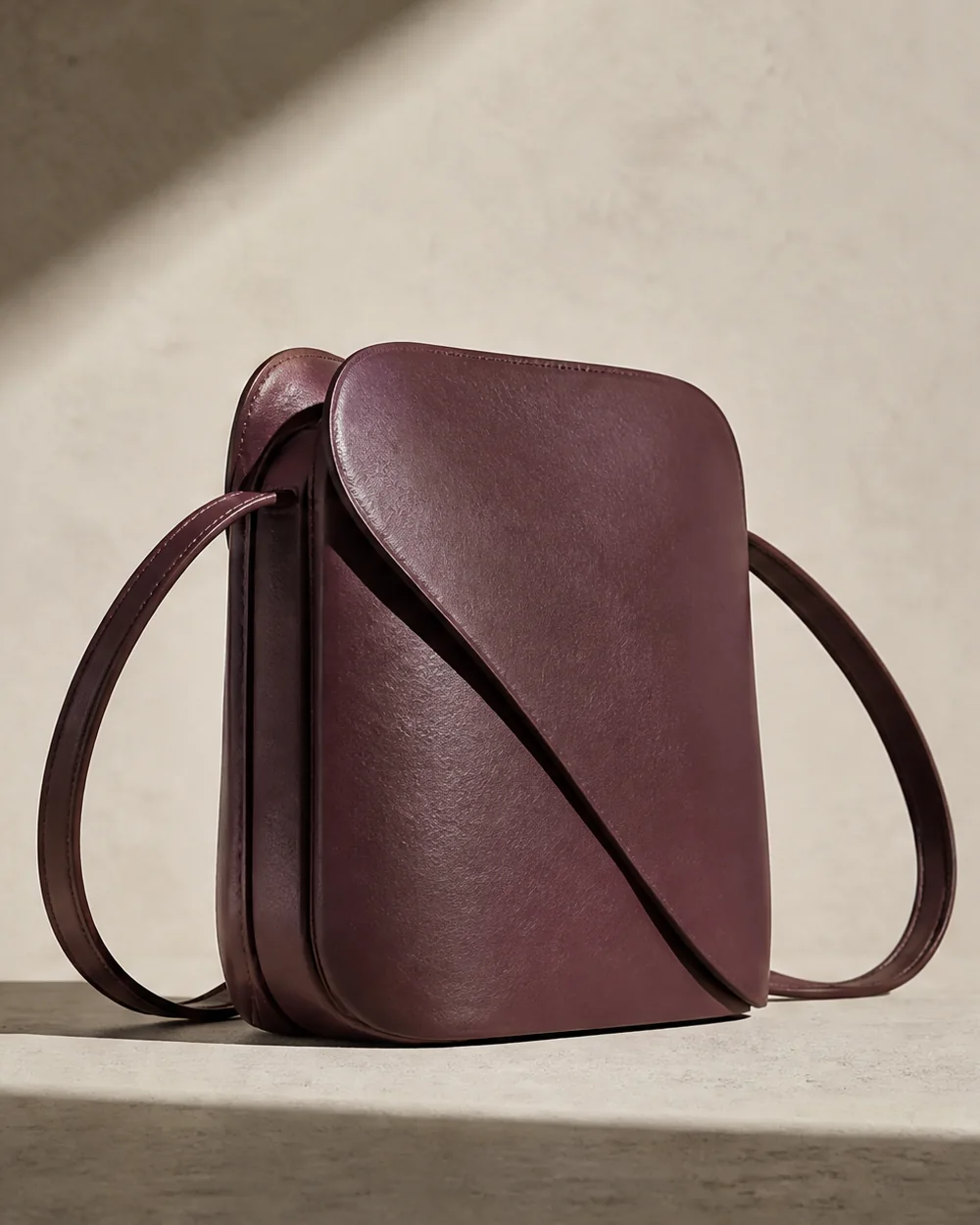 Turn Crossbody in plum, side view