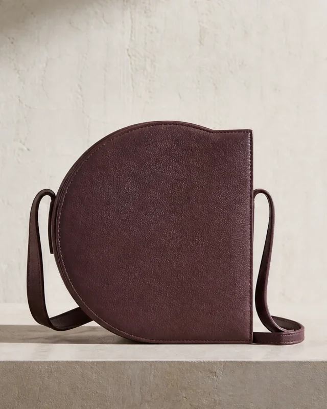 Orbit Crossbody in plum, front view