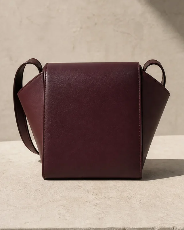 Graft Crossbody in plum, front view