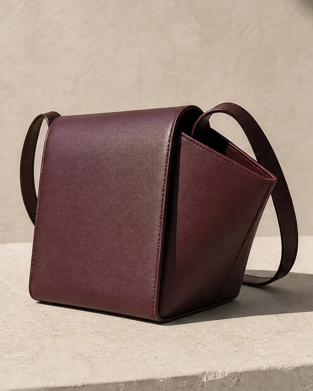 Graft Crossbody in plum, side view