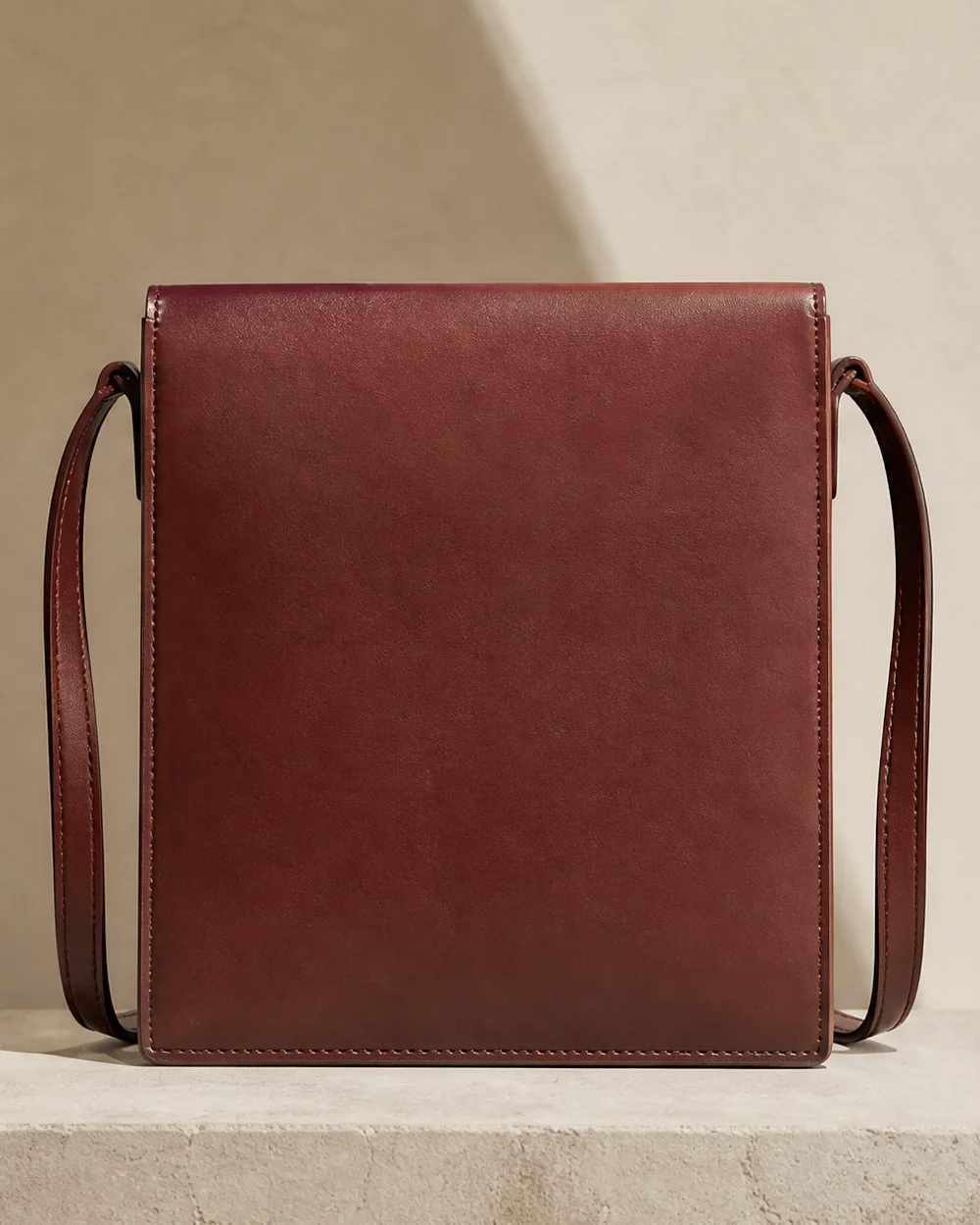Bracket Crossbody in sienna, back view