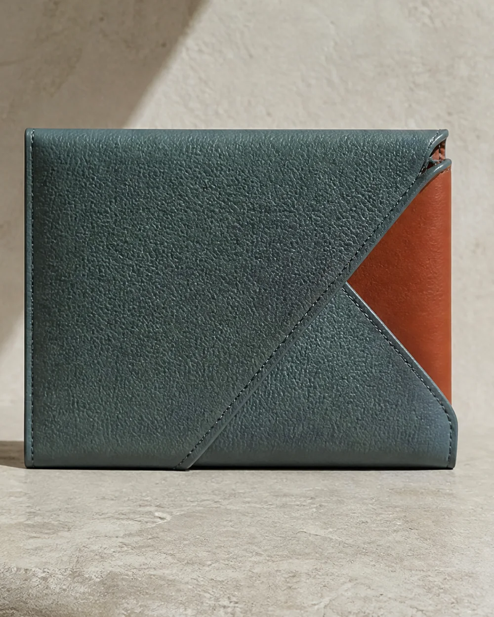 Corner Wrap Pouch in teal / terracotta, front view