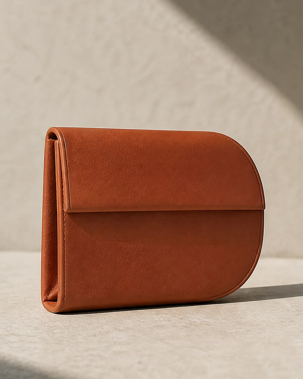 Fillet Coin Pouch in terracotta, side view