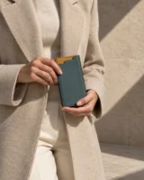Note Card Folio in teal worn with a tailored outfit