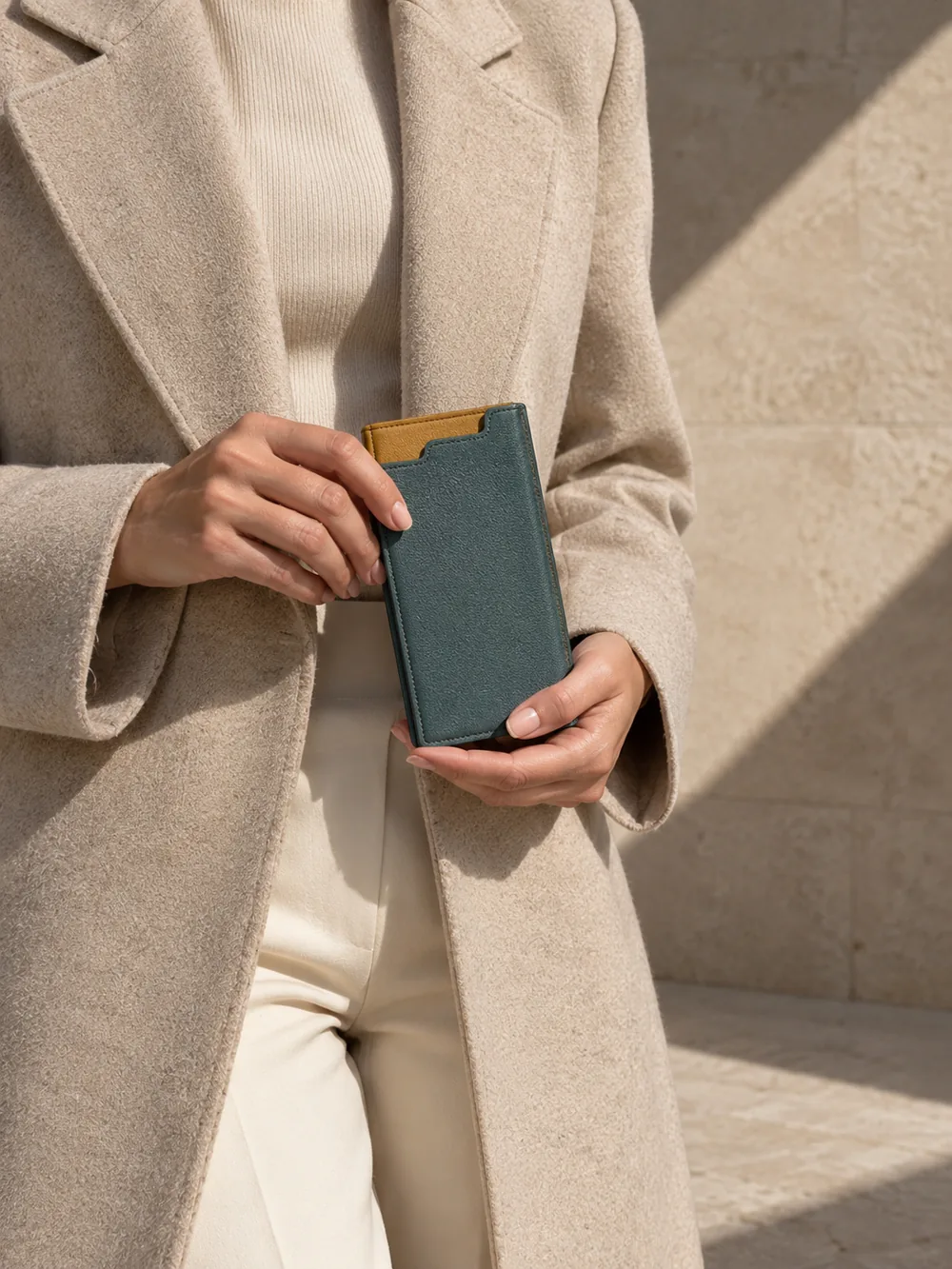 Note Card Folio in teal worn with a tailored outfit