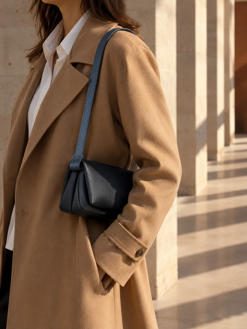 Bridge Short Strap in slate blue worn with a tailored outfit