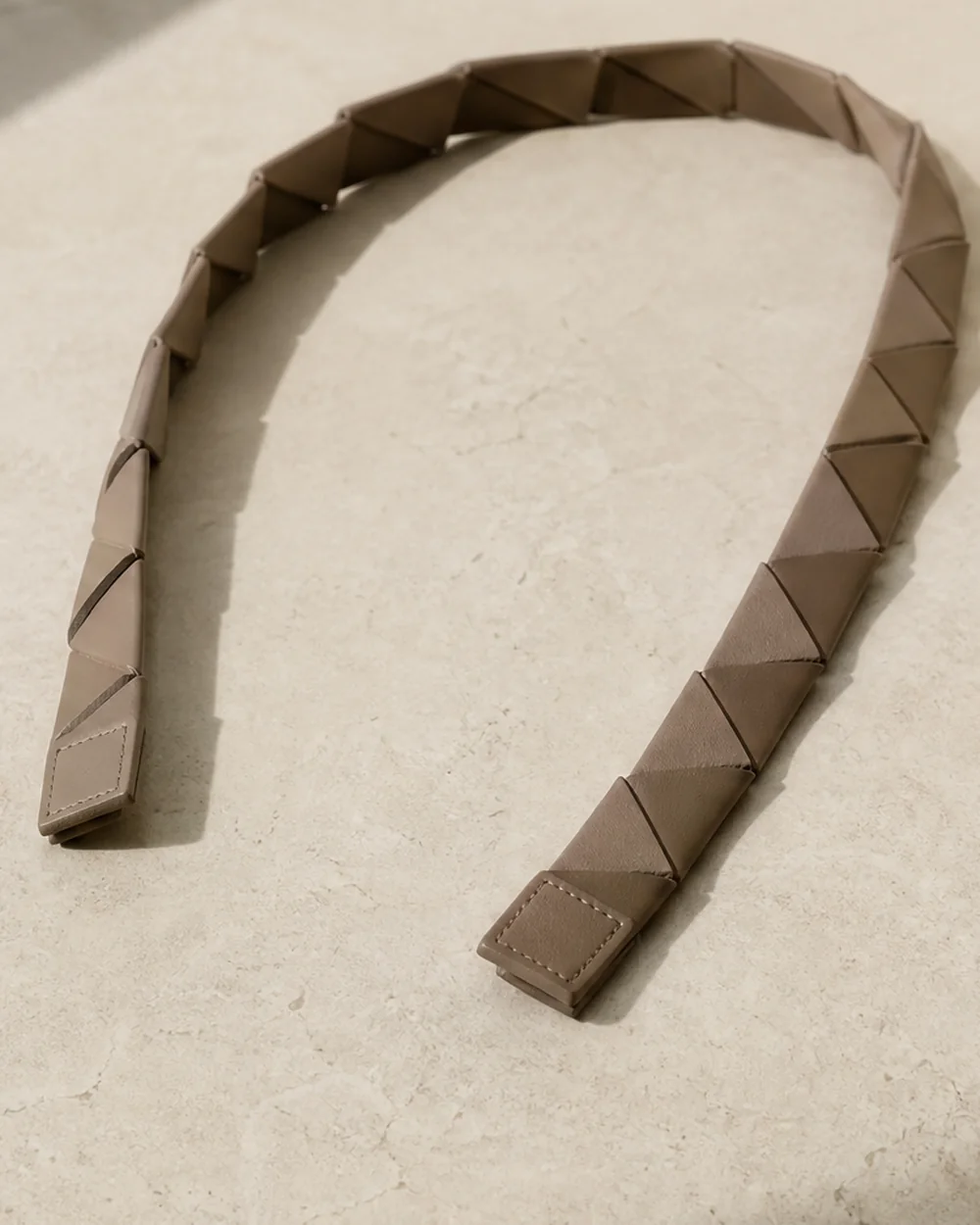 Tension Segmented Strap in stone, side view