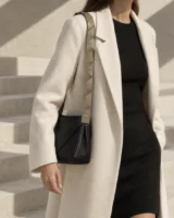 Tension Segmented Strap in stone worn with a tailored outfit