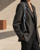 Link Sculpted Strap in slate blue worn with a tailored outfit