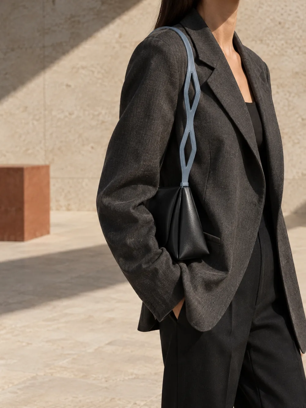 Link Sculpted Strap in slate blue worn with a tailored outfit